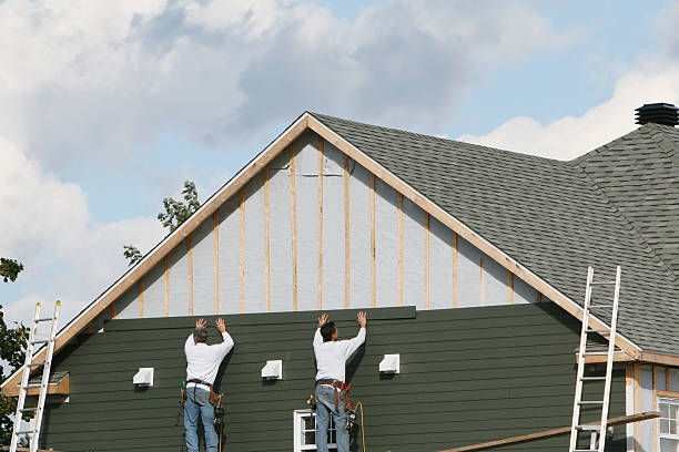 Professional Siding Contractor technician working in Hadley, PA